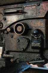 Close-up of old and rusty diesel engine. Selective focus.