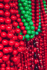 Wooden red beads on the market
