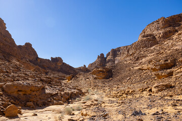 Natural outcrop rock formations near the Al Sahary resort  in Al Ula, north west Saudi Arabia - obrazy, fototapety, plakaty