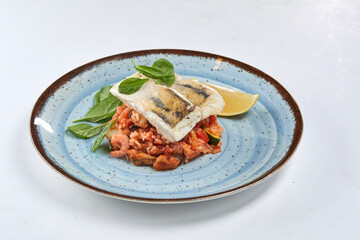 white fish with rice and vegetables