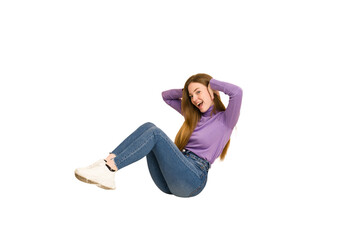 Young redhead woman sitting isolated cut out
