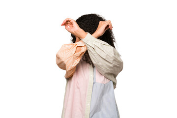 Young african american curly woman isolated keeping two arms crossed, denial concept.