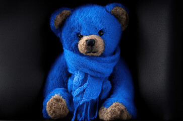 photo of a teddy bear wearing a blue scarf, blue Monday - Generative AI
