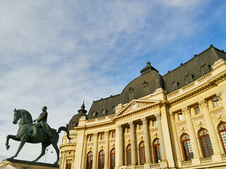 Fototapeta na wymiar Carol I University Foundation and the equestrian statue of Carol I in Bucharest, Romania