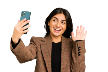 Young indian business woman taking herself a selfie with a mobile phone