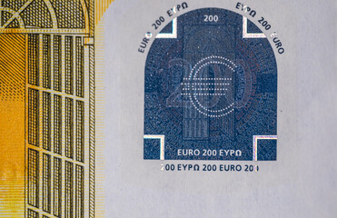 Fragments of the euro banknote in close-up.