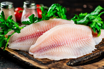 Fresh fish fillet on a cutting board. 