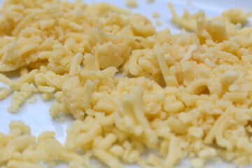 grated cheese. dairy food. meal details. food texture.