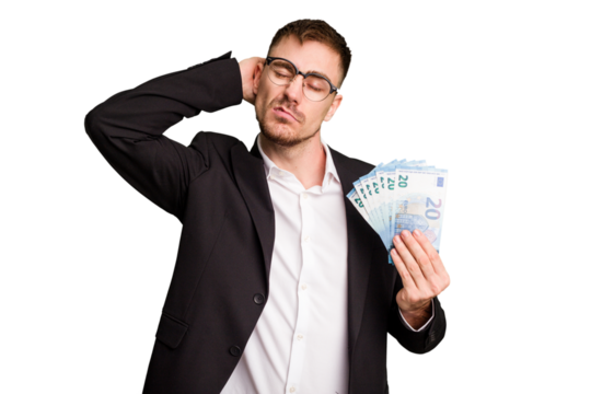 Young business caucasian man holding euro banknotes isolated cut out touching back of head, thinking and making a choice.