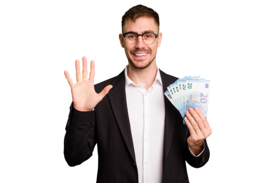 Young business caucasian man holding euro banknotes isolated cut out smiling cheerful showing number five with fingers.