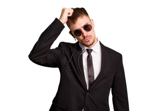 Security bodyguard man wearing a suit isolated cut out being shocked, she has remembered important meeting.