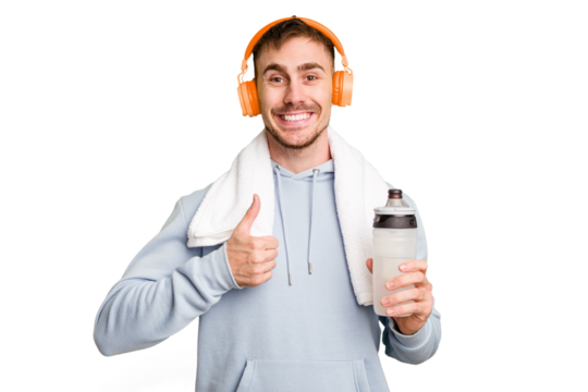 Young caucasian sporty man ready to start his gym day smiling and raising thumb up