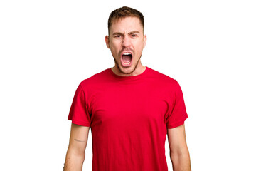 Obraz premium Young caucasian man cut out isolated shouting very angry, rage concept, frustrated.