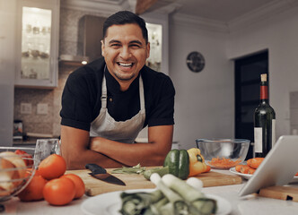 Man, happy portrait and cooking in kitchen for healthy nutrition, food diet and organic vegetables salad. Young male, chef happiness and smile for green vitamins lifestyle or cook dinner in home