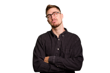 Young caucasian man cut out isolated tired of a repetitive task.