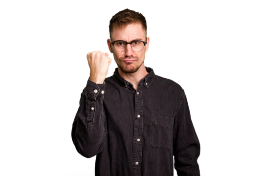 Young caucasian man cut out isolated showing fist to camera, aggressive facial expression.