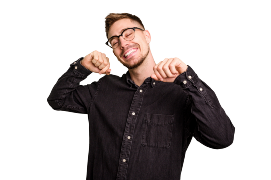 Young caucasian man cut out isolated celebrating a special day, jumps and raise arms with energy. - Powered by Adobe