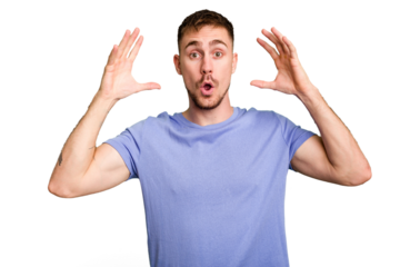 Young caucasian man cut out isolated celebrating a victory or success, he is surprised and shocked.