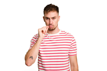 Young caucasian man cut out isolated with fingers on lips keeping a secret.