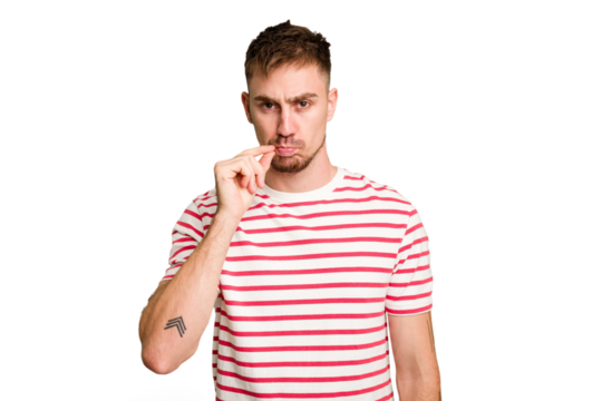 Young caucasian man cut out isolated with fingers on lips keeping a secret.