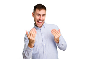 Young caucasian man cut out isolated pointing with finger at you as if inviting come closer.