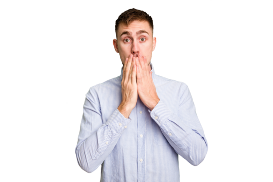 Young caucasian man cut out isolated shocked covering mouth with hands.