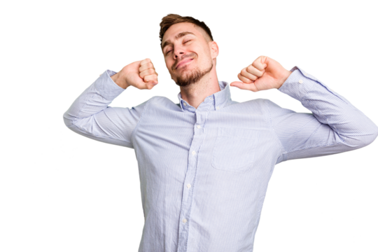 Young caucasian man cut out isolated stretching arms, relaxed position.