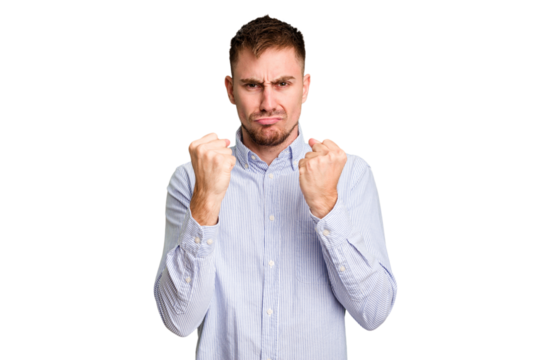 Young caucasian man cut out isolated showing fist to camera, aggressive facial expression.