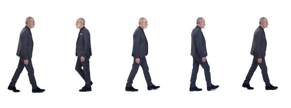 Side View Of A Group Of Same Man With Suit And Tie Walking On White Background