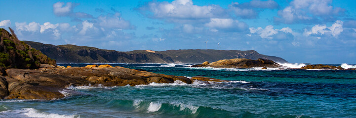 Fototapeta na wymiar panorama of a unique coastline with wind farms on the cliff near west cape howe national park; a unique beach near albany and denmark in western australia