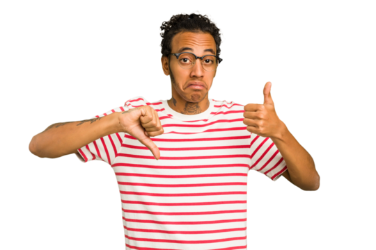 Young African American man isolated showing thumbs up and thumbs down, difficult choose concept