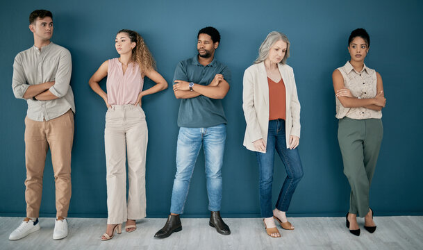 Human resources, hiring and bored people in a waiting room for job interview at office. Onboarding, hr and group of nervous, anxiety or sad business men and women standing in line for recruitment.