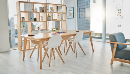 Business, empty meeting room and office, creative space for idea planning with bright interior furniture. Boardroom, design startup and city workplace for teamwork in sunny urban building with nobody