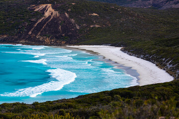 panorama of hellfire bay in cape le grand national park, a paradisiacal beach with white sand and turquoise water surrounded by mighty hills