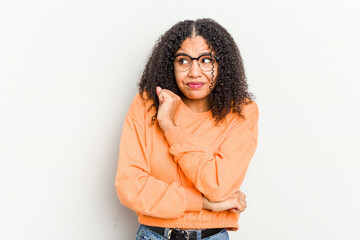 Young african american woman isolated on white background confused, feels doubtful and unsure.