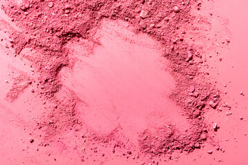 Abstract waves composition made from crushed blush on pink background with copy space in center