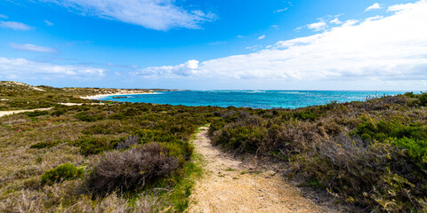 Fototapeta na wymiar a panorama of paradise bay on rottnest island near perth in western australia; the beautiful bays and wild landscape of the island famous for its quokka