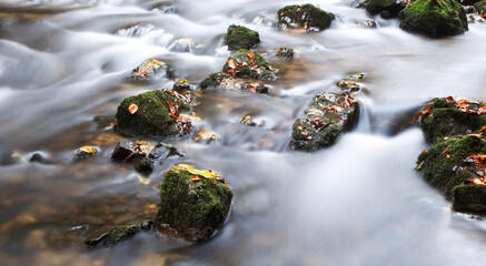 Water concept,river water flowing with light reflecting ,long exposure,light spots,

