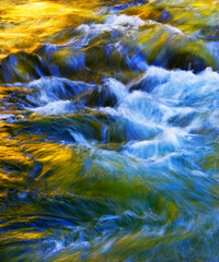 Water concept,river water flowing with light reflecting ,long exposure,light spots,

