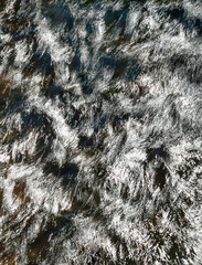 Water concept,river water flowing with light reflecting ,long exposure,light spots,grunge background with space,art background for design,

