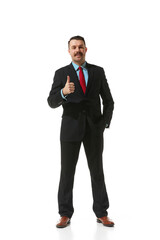 Obraz premium Businessman in a suit showing gesture of approvement and positivity over white studio background. Concept of business, career, innovations, ad