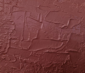 Acrylic and red paint on a wall with brush and palette knife strokes, hand drawing red oil painting on the wall for art of decoration and design.