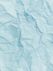 Abstract wrinkled or Free photo crumpled blue paperboard or empty canvas or paper surface with folded stains.	