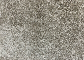 Close up of beige woven carpet