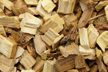 Wood chips for smocking texture background. Natural wood smoking chunks