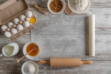 Parchment and baking products on the table. There is space for text.