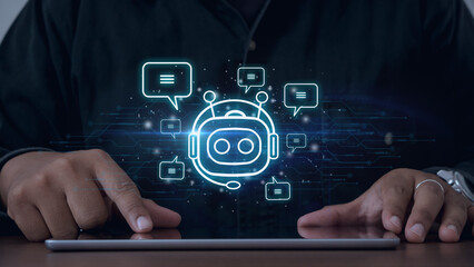 Man hand playing taplet to use digital chatbot for provide access to information and data in online network.Artificial intelligence.