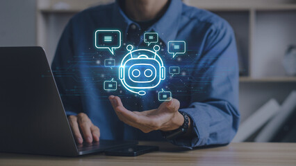 Businessman holding digital chatbot for provide access to information and data in online network.Artificial intelligence.