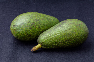 Avocado fruit, Variety: Fuerte, Black felt background