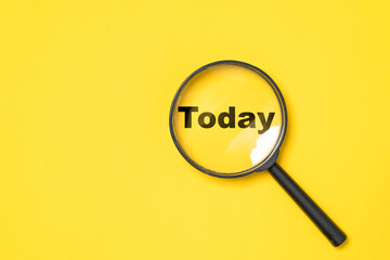 Today wording inside of Magnifier glass on yellow  background for focus current situation ,...